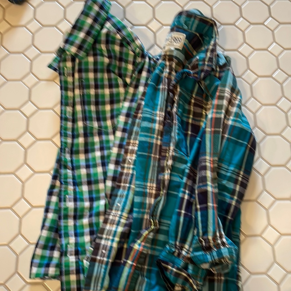 2 plaid button downs. Size 5/6